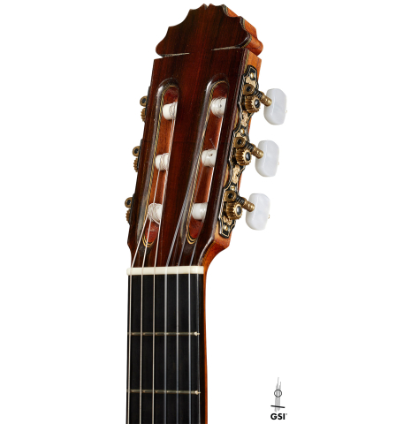 The headstock of a 2003 Manuel Reyes "Negra" flamenco guitar made of spruce and CSA rosewood