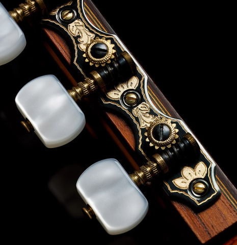 The tuning machines and headstock of a 2003 Manuel Reyes "Negra" flamenco guitar made of spruce and CSA rosewood