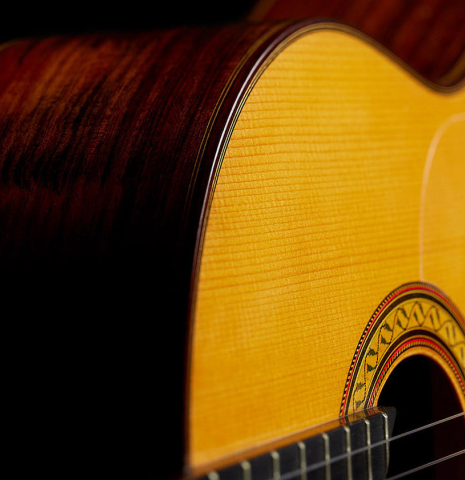 The soundboard and side of a 2003 Manuel Reyes "Negra" flamenco guitar made of spruce and CSA rosewood