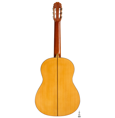 The back of a 1992 Manuel Reyes flamenco blanca guitar made of spruce and cypress