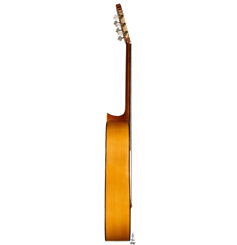 The side of a 1992 Manuel Reyes flamenco blanca guitar made of spruce and cypress
