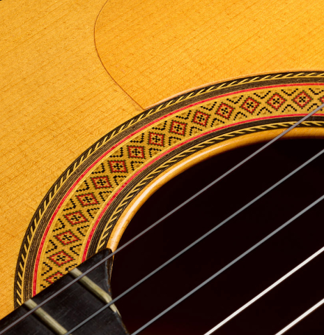 The top, tap-plate and rosette of a 1983 Manuel Reyes flamenco guitar (ex John Dearman) made of spruce and cypress
