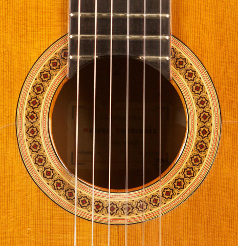 The rosette of a 1968 Miguel Rodriguez (ex Manolo Franco) flamenco blanca guitar made of cedar and cypress
