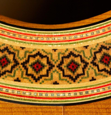 Detailed close-up of the rosette of a 1968 Miguel Rodriguez (ex Manolo Franco) flamenco blanca guitar made of cedar and cypress
