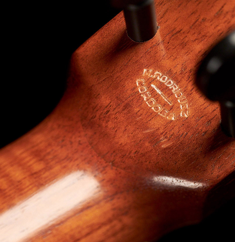 The back of the headstock of a 1971 Miguel Rodriguez flamenco guitar made with cedar and cypress.