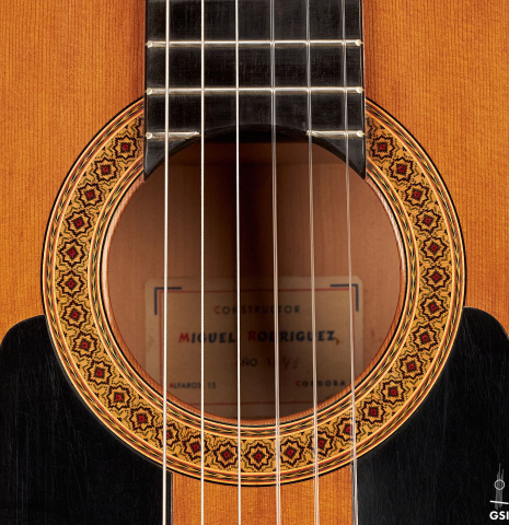 The rosette and tap plates of a 1971 Miguel Rodriguez flamenco guitar made with cedar and cypress.