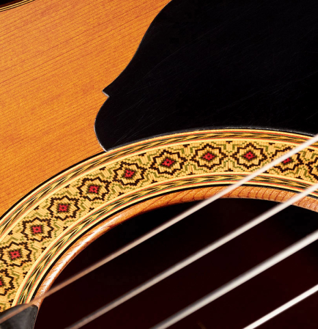 The rosette and tap plates of a 1971 Miguel Rodriguez flamenco guitar made with cedar and cypress.