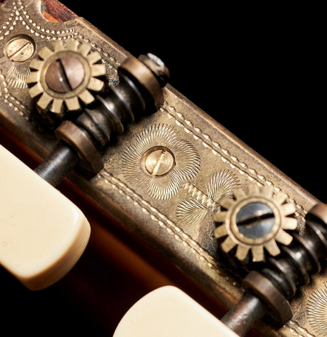 The machine heads of a 1953 Miguel Rodriguez flamenco guitar made of spruce and cypress