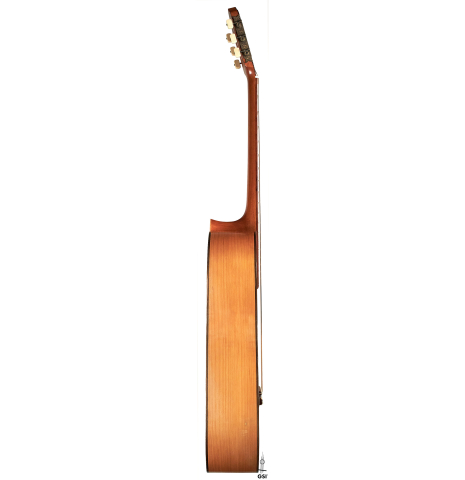 The side of a 1953 Miguel Rodriguez flamenco guitar made of spruce and cypress
