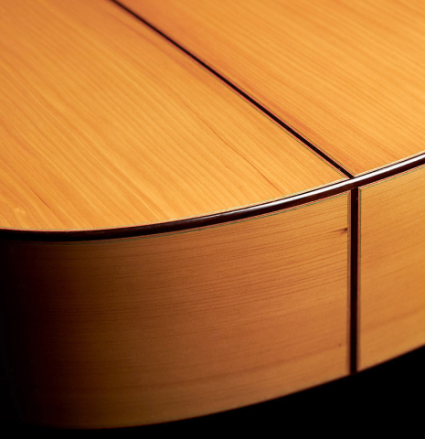 The back and lower bout of a 1990 Miguel Rodriguez flamenco guitar made with spruce top and cypress back and sides.