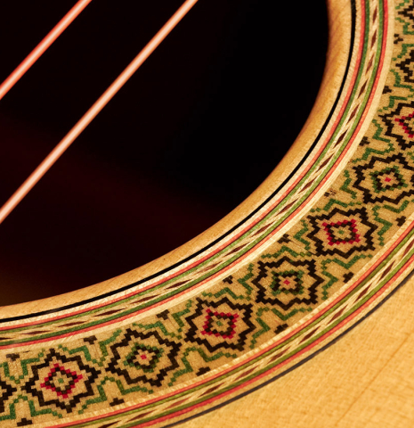The rosette of a 1990 Miguel Rodriguez flamenco guitar made with spruce top and cypress back and sides.
