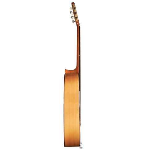 The side of a 1990 Miguel Rodriguez flamenco guitar made with spruce top and cypress back and sides.