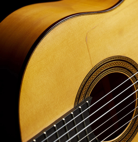 The soundboard and tap plate of a 2025 Rojas &amp; Sanzol flamenco blanca guitar made of spruce and cypress
