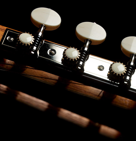 The headstock and tuning machines of a 2025 Rojas &amp; Sanzol flamenco guitar made of spruce and cypress