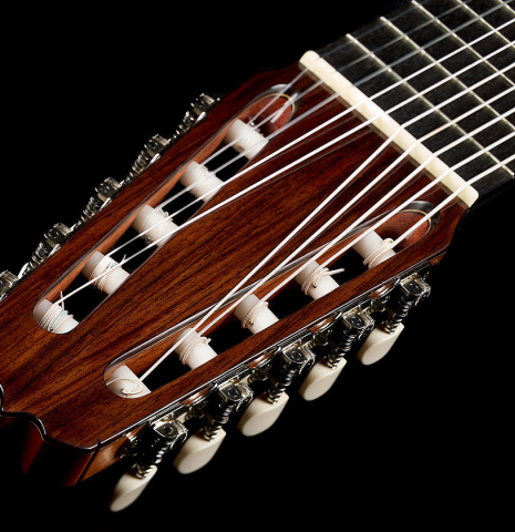 The headstock and tuning machines of a 2025 Rojas &amp; Sanzol "10-string" classical guitar made of cedar and Indian rosewood