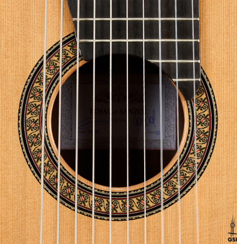 The rosette of a 2025 Rojas &amp; Sanzol "10-string" classical guitar made of cedar and Indian rosewood