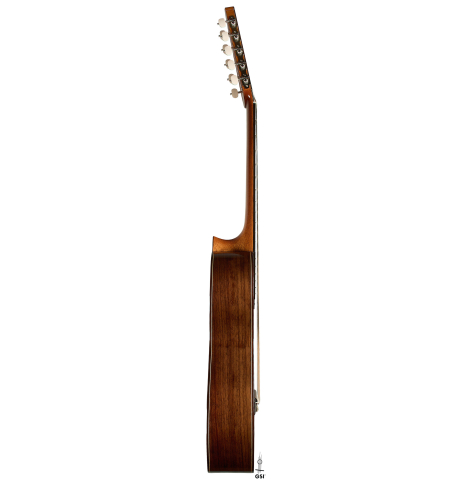 The side of a 2025 Rojas &amp; Sanzol "10-string" classical guitar made of cedar and Indian rosewood