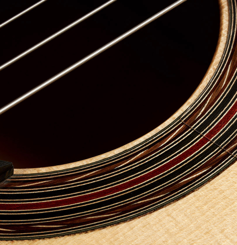 Detail of the rosette of a 2024 Pepe Romero "Negra y Blanca" flamenco guitar made of spruce and CSA rosewood