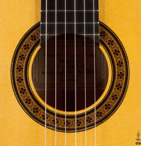 The rosette of a 2005 German Vazquez Rubio &quot;Almeria&quot; flamenco guitar made with spruce and cypress.