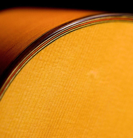 The purfling and binding of a 2005 German Vazquez Rubio &quot;Almeria&quot; flamenco guitar made with spruce and cypress.