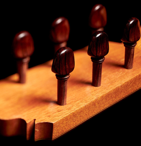 The traditional pegs of a 1967 "Jose" David Rubio "Blanca" flamenco guitar made of spruce and cypress
