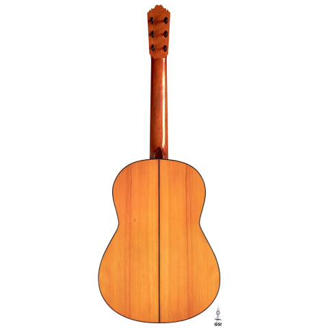 The back of a 1967 "Jose" David Rubio "Blanca" flamenco guitar with traditional pegs made of spruce and cypress