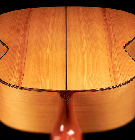 The 2-piece back of a 1967 "Jose" David Rubio "Blanca" flamenco guitar with traditional pegs made of spruce and cypress