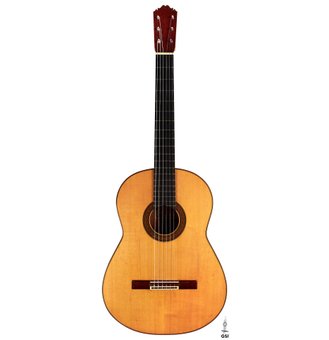 The front of a 1967 &quot;Jose&quot; David Rubio &quot;Blanca&quot; flamenco guitar with traditional pegs made of spruce and cypress