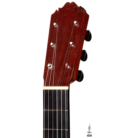 The traditional headstock and pegs of a 1967 "Jose" David Rubio "Blanca" flamenco guitar made of spruce and cypress