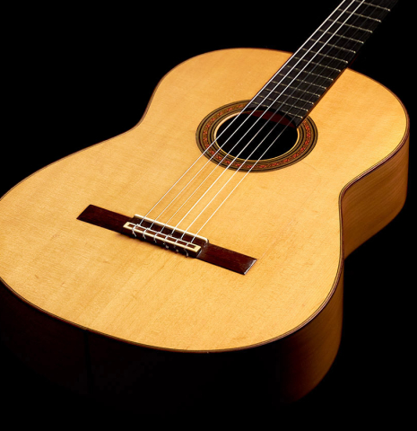 The soundboard of a 1967 "Jose" David Rubio "Blanca" flamenco guitar with traditional pegs made of spruce and cypress