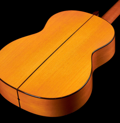 The back of a 2006 German Vazquez Rubio flamenco guitar made of spruce and cypress