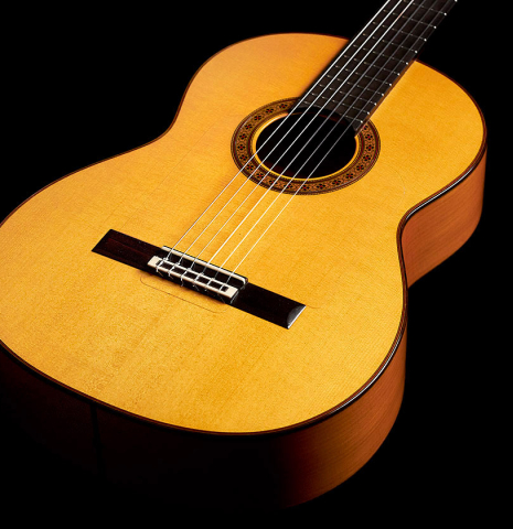 The soundboard of a 2006 German Vazquez Rubio flamenco guitar made of spruce and cypress