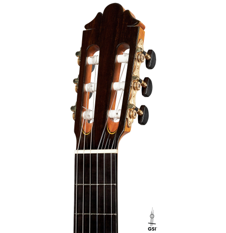 The headstock of a 2006 German Vazquez Rubio flamenco guitar made of spruce and cypress
