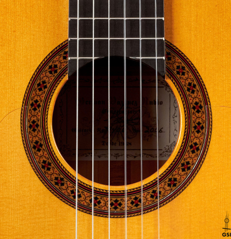 The rosette of a 2006 German Vazquez Rubio flamenco guitar made of spruce and cypress