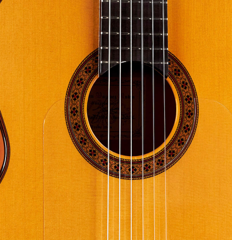 The soundboard of a 2006 German Vazquez Rubio flamenco guitar made of spruce and cypress