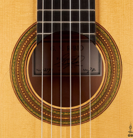 The rosette of a 1997 German Vazquez Rubio flamenco guitar made with spruce and cypress
