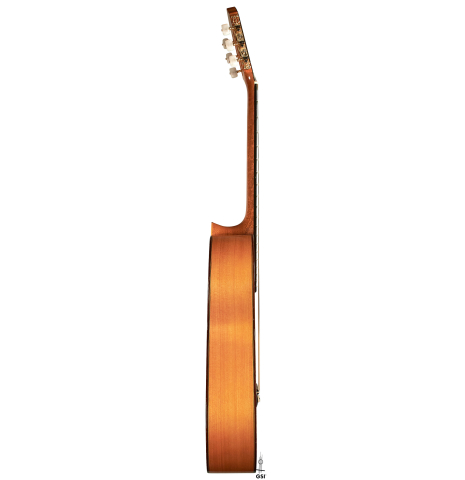 The side of a 1997 German Vazquez Rubio flamenco guitar made with spruce and cypress