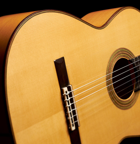 The soundboard of a 1997 German Vazquez Rubio flamenco guitar made with spruce and cypress