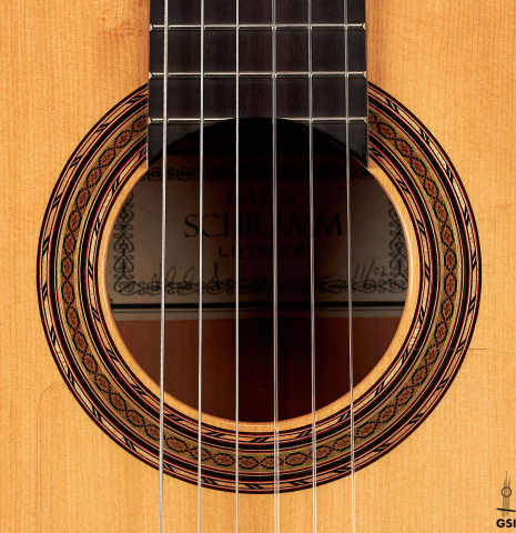 The rosette of a 2002 David Schramm &quot;1951 Barbero, ex Sabicas&quot; flamenco guitar with pegs made of spruce and cypress
