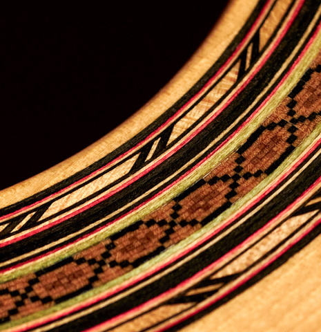 A close-up of the rosette of a 2002 David Schramm &quot;1951 Barbero, ex Sabicas&quot; flamenco guitar with pegs made of spruce and cypress