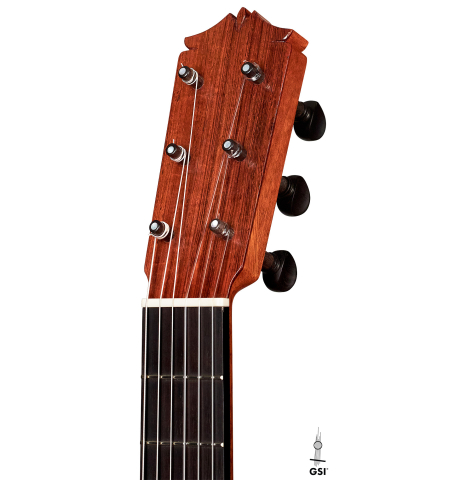 The headstock and traditional pegs of a 2002 David Schramm &quot;1951 Barbero, ex Sabicas&quot; flamenco guitar made of spruce and cypress