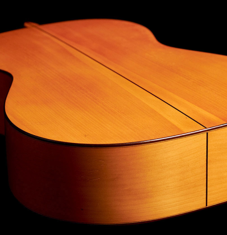 The lower bout of a 1969 Manuel Velazquez "Flamenco Blanca" guitar made of spruce and cypress