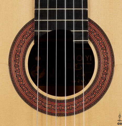 The rosette of a 2024 Gao Yi flamenco guitar made of spruce and cypress