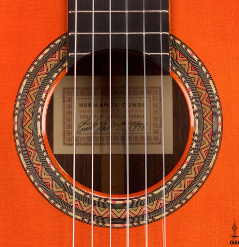 The rosette of a 1996 Conde Hermanos &quot;AF 25&quot; flamenco guitar made with spruce and Indian rosewood