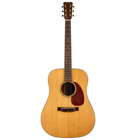 The front of a 1951 Martin D-18 steel-string guitar made of spruce and mahogany