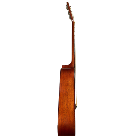 The side of a 1951 Martin D-18 steel-string guitar made of spruce and mahogany