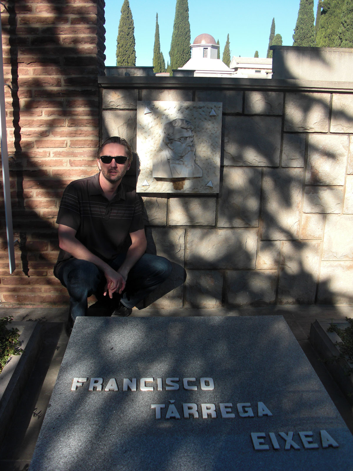 Kneeling at the grave of Francisco Tarrega, also in Castellon.